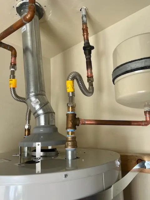 Water heater installation and plumbing repair in Maplewood